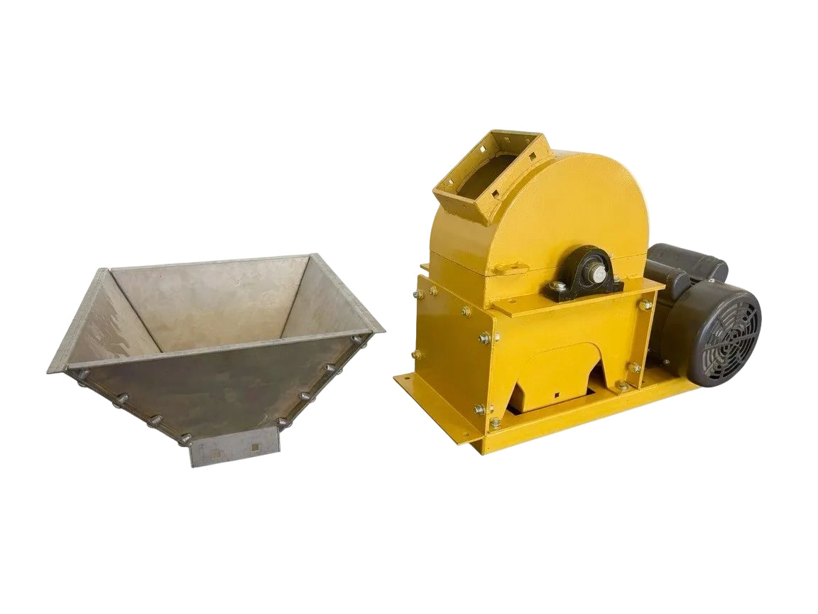 Yellow mechanical device with a metal container on a white background